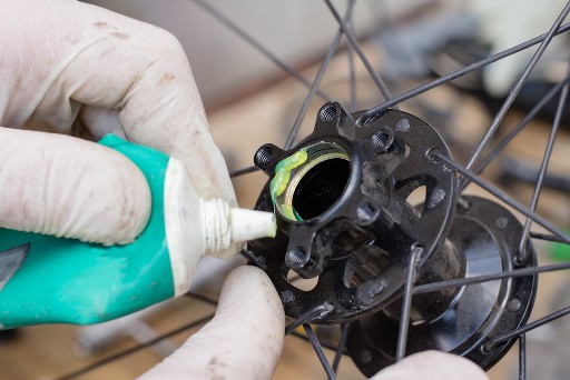 Replacing a bearing on a rear hub of a bike.